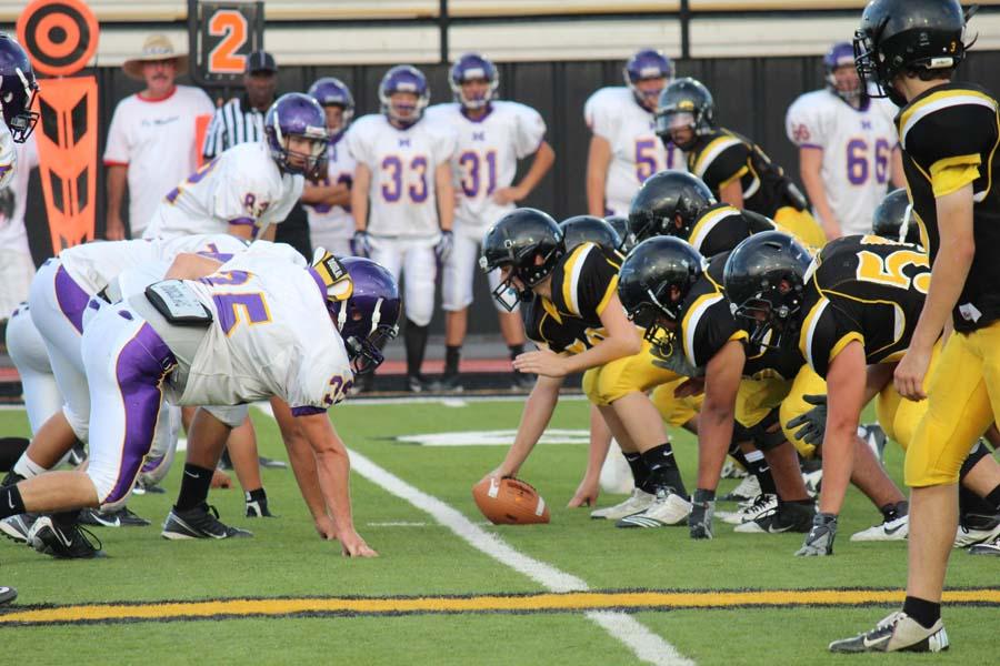 The offensive line prepares for the snap during the 24-0 win over Merkel in the season opener on Aug. 29.