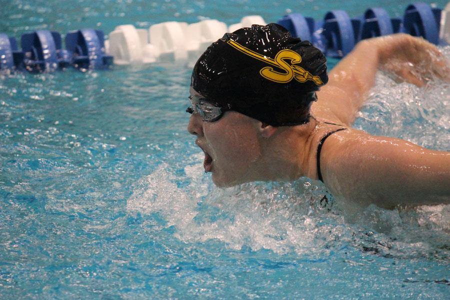 On the fly--
Junior Arin Hindman competes in the 100 butterfly during the Keller meet. Hindman took sixth with a time of 1:25.91.