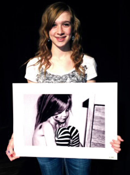 Statebound--
Junior Amanda Peters shows off her artwork which earned her a state berth in the Visual Art Student Event competition on Feb. 22 at Frenship High School. Senior Morgan Guffey also qualified for state.