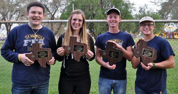FFA scholars--
Seniors Ryder Mata, Sadie Jenkins, Alec Winfrey and Sawyer Jenkins hold scholarship plaques. The quartet amassed $5,500 in scholarships at the Permian Basin Fair.