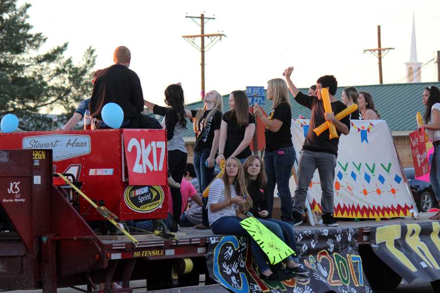 Sophomore float--
Sophomores ride their float during the Oct. 2 parade. The parade took a more residential route for the first time.