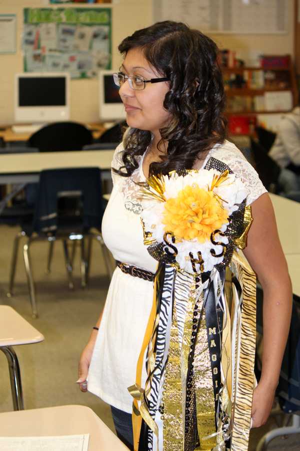 Homecoming mum--
Sophomore Maggie Najera wears her decorative corsage on Oct. 3.