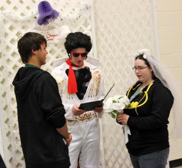 Gettin hitched--
Senior Michael Elias marries a freshman couple during the fall festival. Elias was was the fourth Elvis to make an appearance in the festivals history.