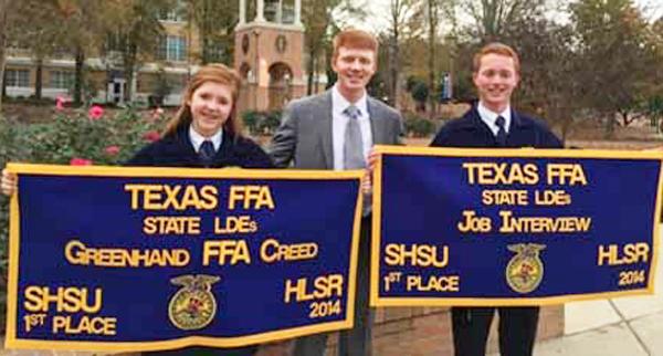 Double win--
Senior FFA member Alec Winfrey and his sister, eighth grader Carlye Winfrey take state championships in job interview and junior creed speaking. The Winfreys are shown with FFA sponsor Ryan Best.