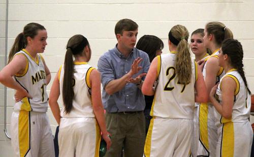 Strategy session--
Coach Coleman Gant talks to his players during a huddle in district play against Pecos on Feb. 10.
The Maidens outscored the Lady Eagles by 41 points for the win.