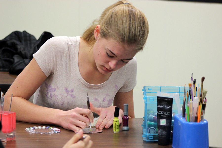 Perfecting the process--
Junior Judy Klassen works on nail techniques during second period cosmetology. Klassen took first place in nail art at state competition and advanced to nationals in Louisville, Ky., in June.
