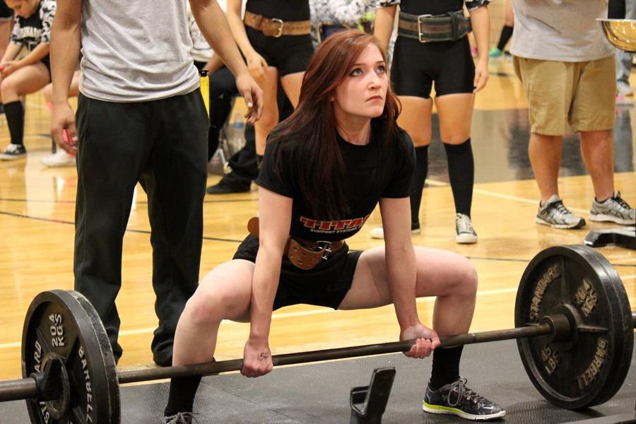 Take the weight--
Junior Madi Werner deadlifts at the home meet in February.