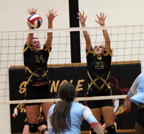 A brick wall
Juniors Cambri Addison and Brogan Purser block a Monterey kill during nondistrict play on Sept. 15. The Maidens combined for eight blocks in the match.