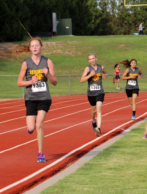 Three, four, five
Sophomore Lacy Jackson, freshman Taylor McGehee and freshman Amanda Villalva take the final 300 yards at the Plains meet on Sept. 12. The Maidens finished third, fourth and fifth respectively and helped the Maiden varsity take second place in the meet.