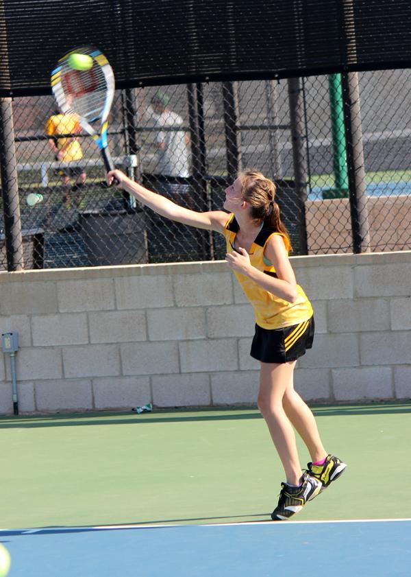 Winning ways
Junior Debbie Froese serves the ball during match play against Levelland on Sept. 1. Froese is the only team member to record wins both in varsity doubles and singles so far this season.