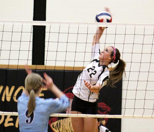 Take that
Junior strong side hitter Brogan Purser attacks the net during district play with Greenwood. Purser had 16 attacks in the district win for the Maidens.