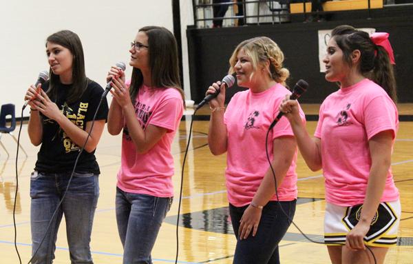 Song for cure
Seniors Sadie Wheeler, Bryce Darby, Jasmine Ochoa and Tori Acosta perform “Fight Song” at the Oct. 16 pep rally.