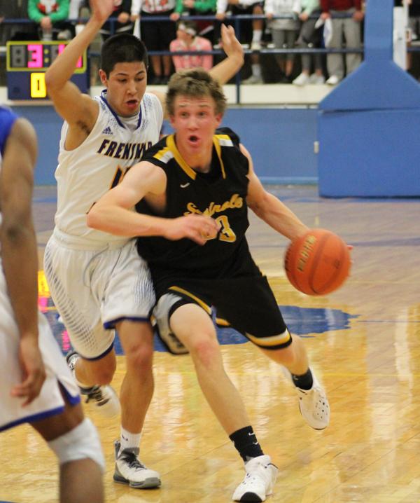 Driving in
Senior guard Luke Wimmer drives into Frenship’s defense during preseason play on Dec. 8. Wimmer had 17 points in the 62-61 overtime loss to the Tigers.