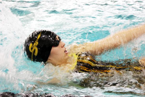 Fresh start--
Junior Kree Ellison swims the first leg of the 200-yard medley relay at the Andrews meet on Jan. 9. The relay went on to qualify for regionals at the district meet on Jan. 23.