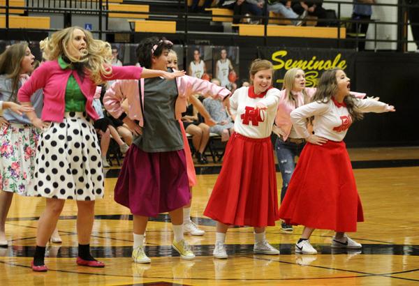 Fifties frolic--
Cast members from Grease entertain the pep rally crowd on Jan. 22. They were raising awareness of their opening night.