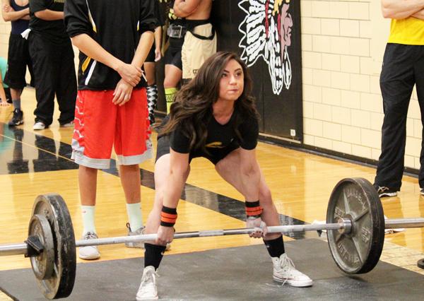 Over twice her weight--
Junior Amanda Rodriguez deadlifts 285 pounds to win the home meet on Jan. 30. Rodriguez took first in the 114-pound weight class with a total of 680 pounds over three events.