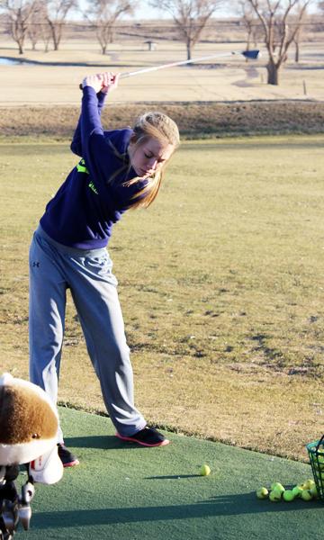 Practice swings--
Sophomore Mallorie Duncan works her long game during practice on Jan. 27.