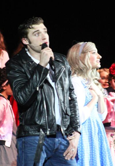 Leading roles--
Seniors Blayne Childers as Danny and Sadie Wheeler as Sandy sing during the Jan. 25 performance of the musical Grease.
The theater department presented three performances.