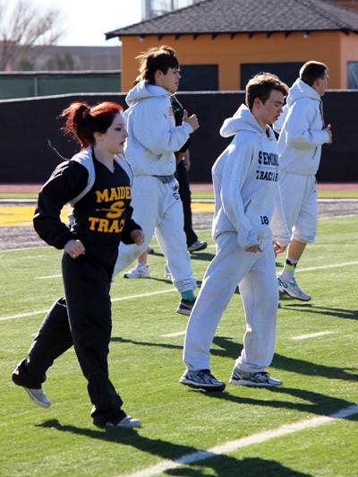 Warm up--
Indian and Maiden track athletes warm up during practice on Feb. 11. The team will compete in Monahans on March 4.