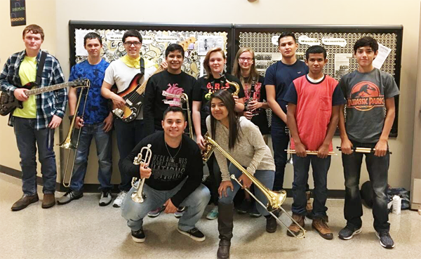 Jazz band tryout--
Students who tried out for all-region jazz band pose for pictures afterward.