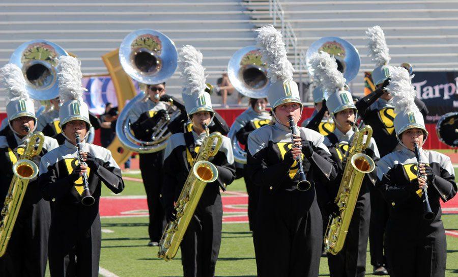 Marching+contest--%0AThe+Pride+of+the+Tribe+performs+in+the+prelims+at+the+Tumbleweed+Classic+in+Denver+City+on+Oct.+15.+The+band+took+first+in+4A+and+third+overall.