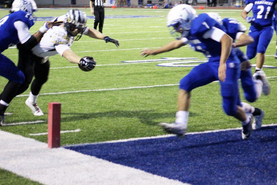 Stretch to score--
Junior running back Cade Barnard puts the ball over the goal line during a 13-yard run for a touchdown in the first quarter in Fort Stockton on Oct. 28. The Indians defeated the Panthers, 39-14, for their third win in district and the fourth place spot for the playoffs.