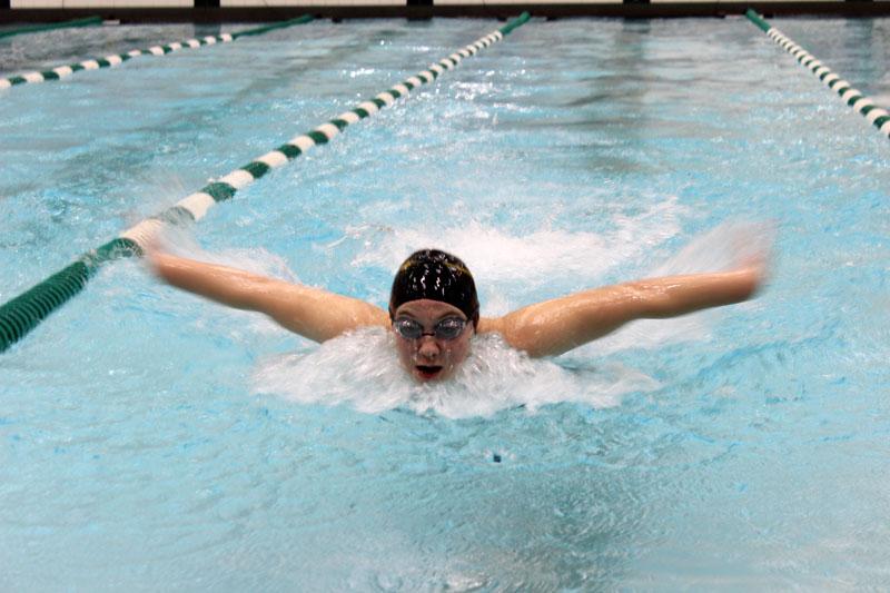 On+the+fly--%0ASenior+Faith+Klassen+swims+the+butterfly+third+leg+of+the+200-yard+medley+relay+at+the+Monahans+meet+on+Oct.+29.+The+team+of+Klassen%2C+junior+Meredith+Rempel%2C+senior+Regina+Froese+and+senior+Lena+Martens+took+sixth+in+the+meet+with+a+time+of+2%3A33.75.