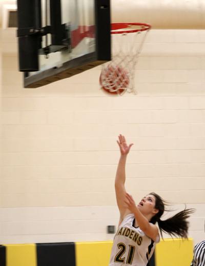 Putting up points--
Freshman Mackenzie Andrews shoots a layup in the 39-19 win over Odessa High on Dec. 13