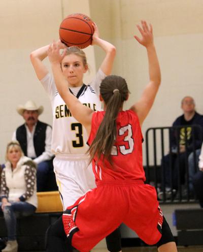Who’s open?--
Sophomore Taylor McGehee looks for a teammate during the 29-24 loss to Odessa High on  Dec. 13.