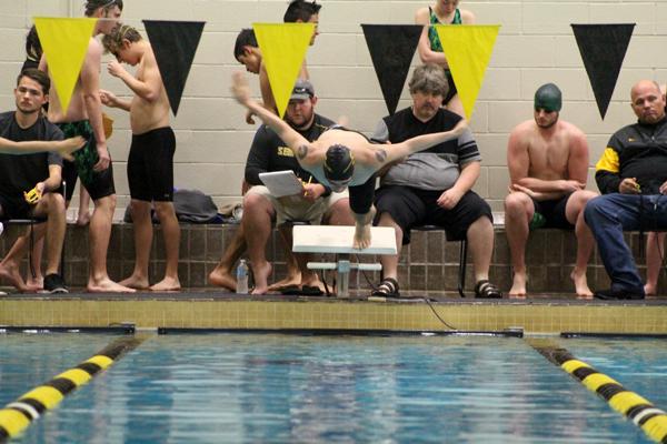 Take off--
Senior Aaron Espinoza takes off from the blocks during competition at the home meet on Dec. 10. Espinoza took ninth in the 100-yard freestyle and 13th in the 50-yard freestyle.