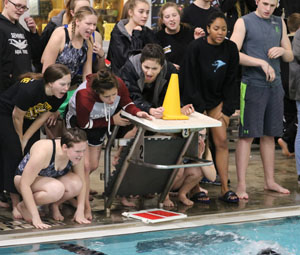 Go, go, go!
Aqua Tribe members scream during a teammates turn during the district meet in Andrews on Jan. 21. The Maidens took fifth and the Indians took sixth in the 1-4A tournament.