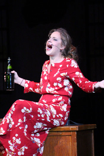 Hannigan shenanigans--
Senior Nikki Loewen plays Miss Hannigan during the winter musical Annie. She sang “Little Girls”.