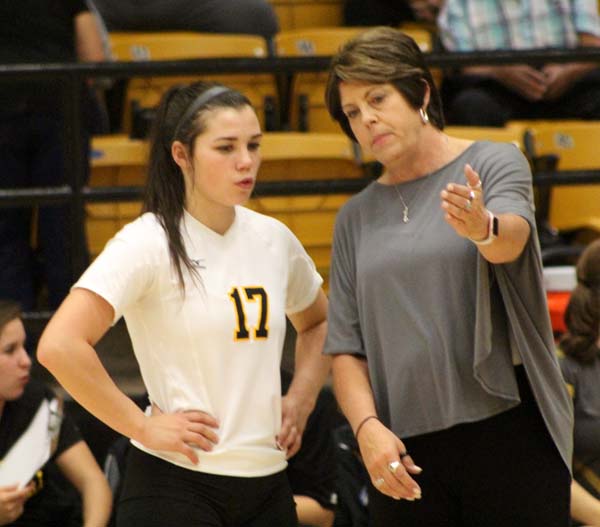Strategy session--
New Maiden Coach Traci Pierce gives senior libero Alyssa Wade tips during district play versus Estacado on Sept. 26. The Maidens moved to 2-0 in district with the 25-7, 25-9, 25-11 win over the Matadors.