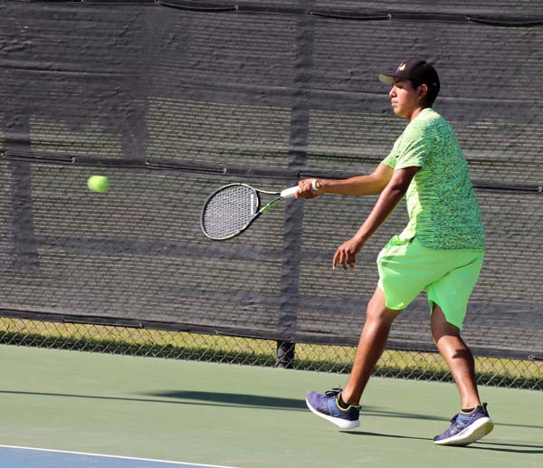 Back at yah--
Junior Chris Lopez Delgado returns volley during district play with Brownfield on Sept. 19. Lopez Delgado fell to the Lobos Nik Salazar, 6-3, 7-6 in singles.