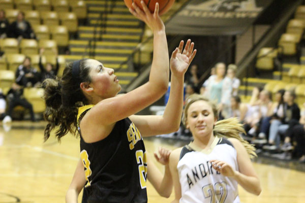 Freshman phenom--
Freshman forward Bretlei Dominguez goes in for a layup during preseason play with Andrews on Nov. 14. Dominguez had 15 points in the 90-38 Maiden win.