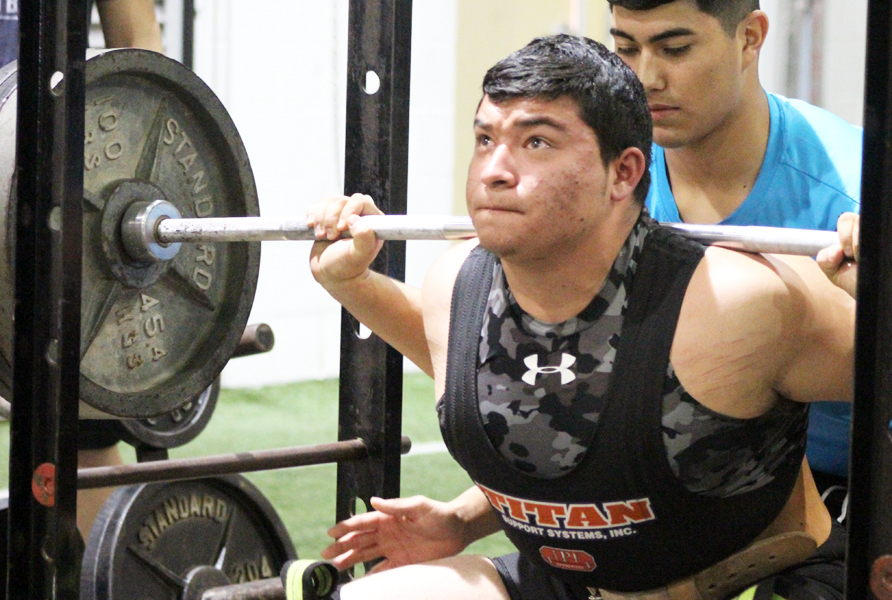 Concentration--Junior+Ian+Alvidrez+competes+in+squats+during+the+home+powerlifting+meet+on+Feb.+2.+Alvidrez%2C+who+qualified+for+state+in+second+place%2C+will+compete+in+Abilene+on+March+24.