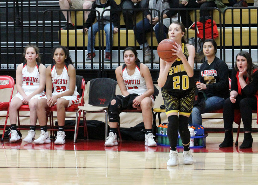 Taking+aim--Junior+guard+Madison+Petty+spots+up+for+a+three-point+shot+during+region+quarterfinal+action+versus+Levelland+on+Feb.+20.+The+Maidens+fell%2C+56-24%2C+to+the+Loboettes.