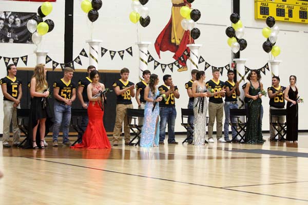 Homecoming court--
The homecoming court and their escorts are introduced at the pep rally on Oct. 12.