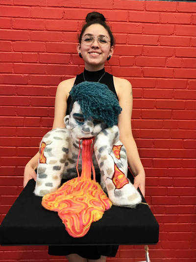 Silently saying so much--
Senior Victoria Lujan qualified a second year in a row for state VASE, this year with her sculpture Incomprehensible Silence.