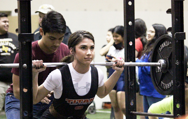 First time first--
Senior Chloe Gonzales squats 225 pounds at the Seminole meet on Jan. 24. Gonzales took first place in her first ever performance in the 132-pound division.