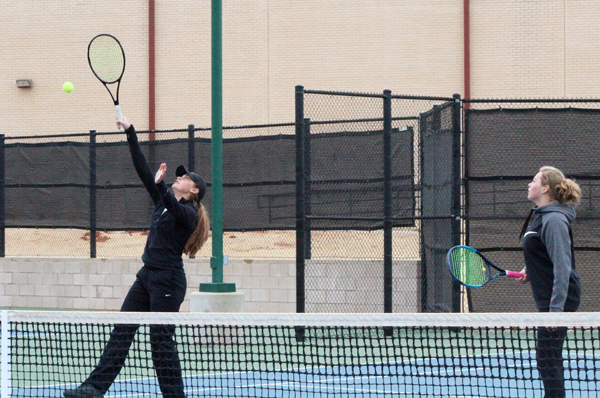 Getting ready--
Junior Jasmin Klassen and sophomore Lauren Smith volley in warm up before their match against Coopers Abby Henderson and Sophie Dunman on Feb. 2. The Maidens won the match 7-6, 7-4.