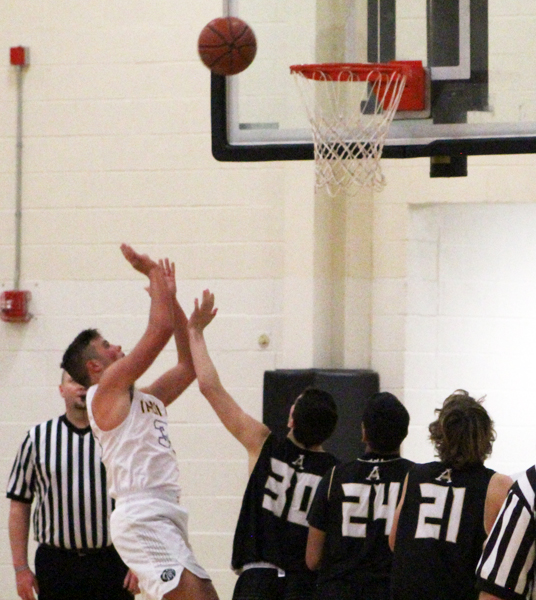 To the hoop--
Junior Kaedyn Wade shoots a lay up over Andrews defenders on Feb. 5. The Indians took the win over the Mustangs 48-39.