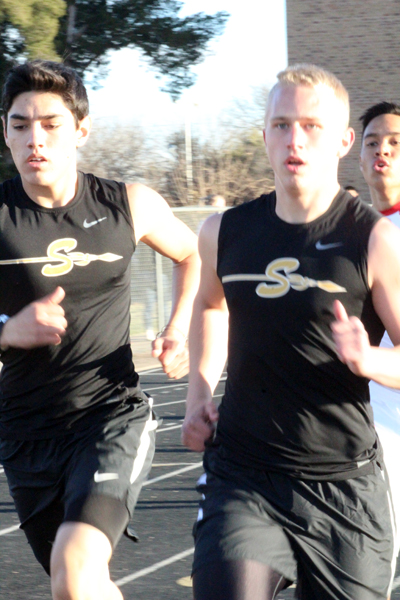 Two times around--
Sophomore Landon Curtis and senior Jude Gomez enter the second lap to the 800 meters at the Lamesa track meet on Feb. 28. Curtis finished first and Gomez was sixth.