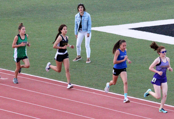 Breaking the record--
Sophomore Hailey Davis finds her pace during the 1,600 meters in Andrews on April 4. Not only did Davis take the district championship, but she also broke the school record in 5 minutes and 36.95 seconds.