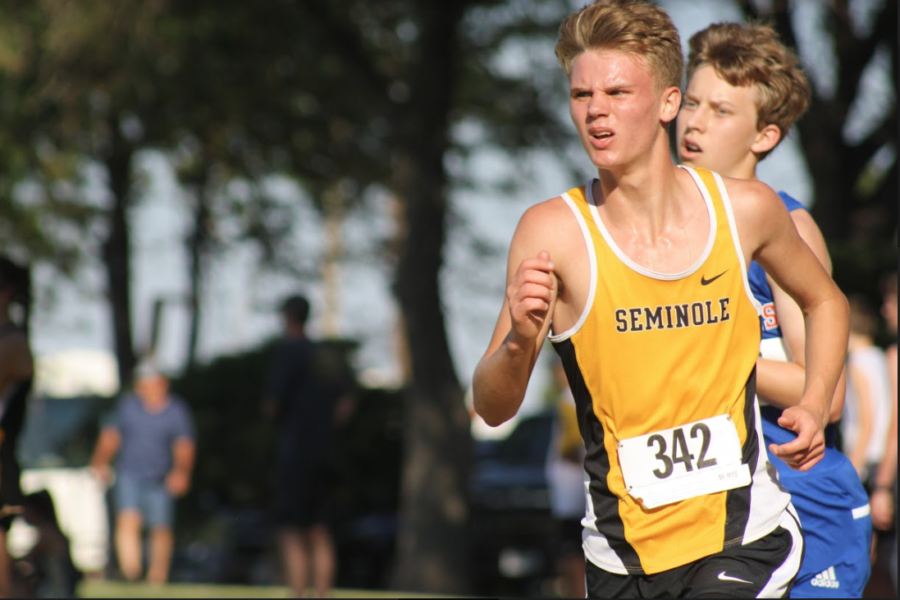 RUNNING THE ROUTE--Junior Micah Smith travels the course at the Plains meet at Yoakum County Park on Sept. 7. Smith came in 12th as the team finished sixth.