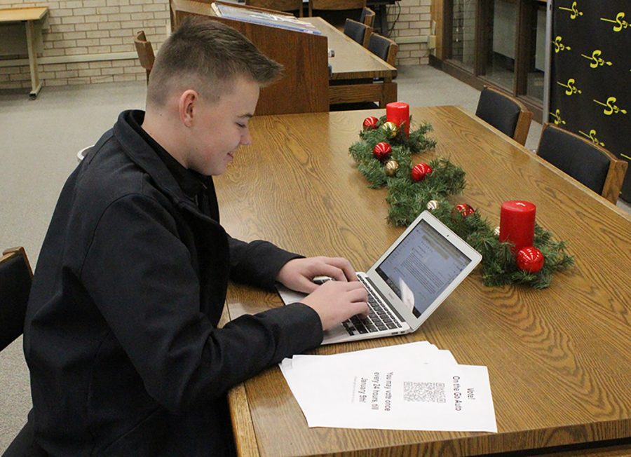 Making plans--
Sophomore Ervin Friesen works on the business plan for On The Go Auto on Dec. 10. Friesen and sophomore Davis Banman submitted the entrepeneur plan to Red Raider Start Up’s contest.