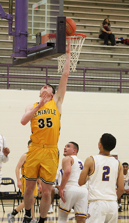 District opener--
With 19 points, junior post Blake Hamblin led the Indians in the first district game in Pecos on Jan. 21. The Indians dominated the Eagles, 86-26.