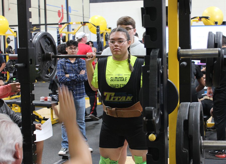 Senior squatter--Senior Yarely Delgado waits for the judge as she competes in the squats on Jan. 13. Delgado took first in the 2599-pound division with a total of 640 pounds.