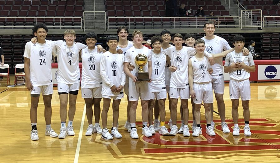 Bi-district+champs--The+Indian+basketball+team+took+the+bi-district+trophy+with+a+57-35+win+over+Clint+Mountain+View+on+Feb.+22+in+Alpine.
