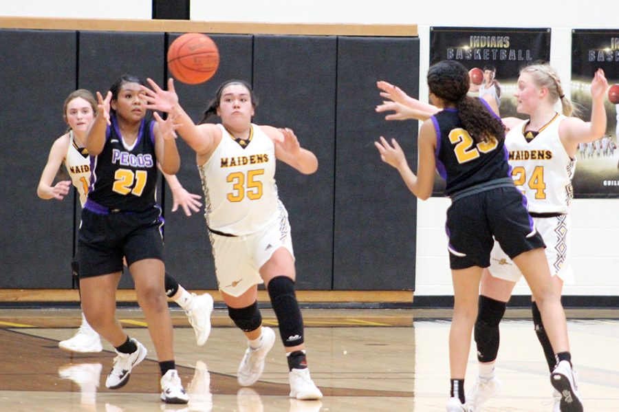 Go get it--Junior post Dalayni Perez jumps the Pecos passing lane during district play on Jan. 25. Perez had 11 points in the Maiden victory.